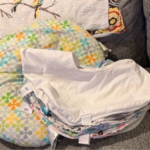 2 boppy pillow inserts and a bunch of different washable covers.